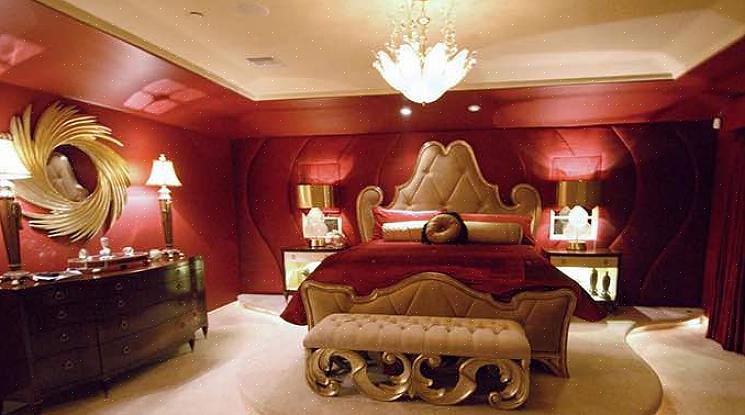 Een ander alternatief is om rood te gebruiken in meubels of een hoofdeinde zoals deze mooie slaapkamer