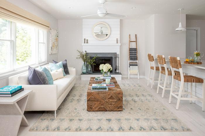 Zorg er bij het kiezen van een karpet voor dat het onder alle belangrijke meubelstukken in de kamer