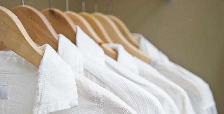 Wordt het overgaan van gekleurde kleding waardoor de witte stof er dof uitziet
