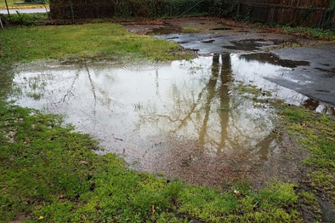 Kan een droge kreek het afvoerwater in een regenafvoer of een droge put legen